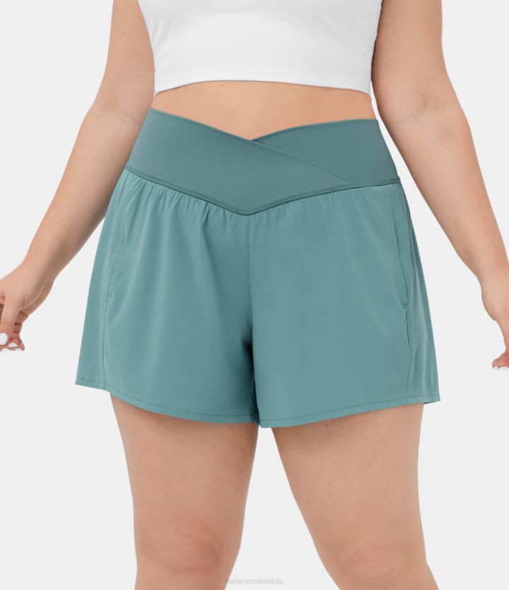 fondos azul mineral BBV2NZ1287 mujer Halara pantalones cortos de yoga de secado rápido 2 en 1 con bolsillo lateral cruzado y talle alto, de talla grande, de 4,5"